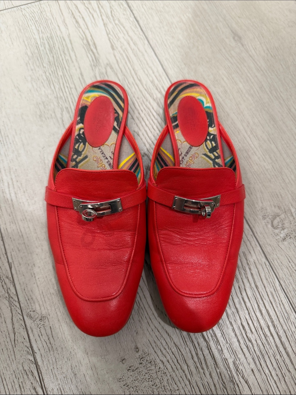 Red Leather Slip-On Loafers with Silver Buckle